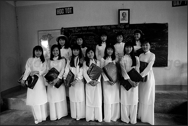 Na Trang town. Young high school students with the traditional dress Ao Dai